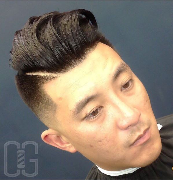 disconnected high fade with long hair top