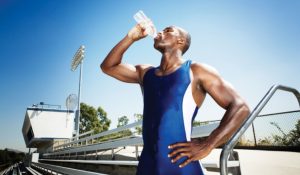 athlete drinking water
